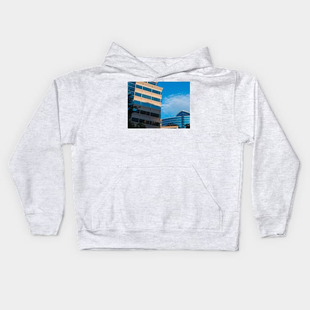 Buildings, shadows, sky Kids Hoodie by thadz